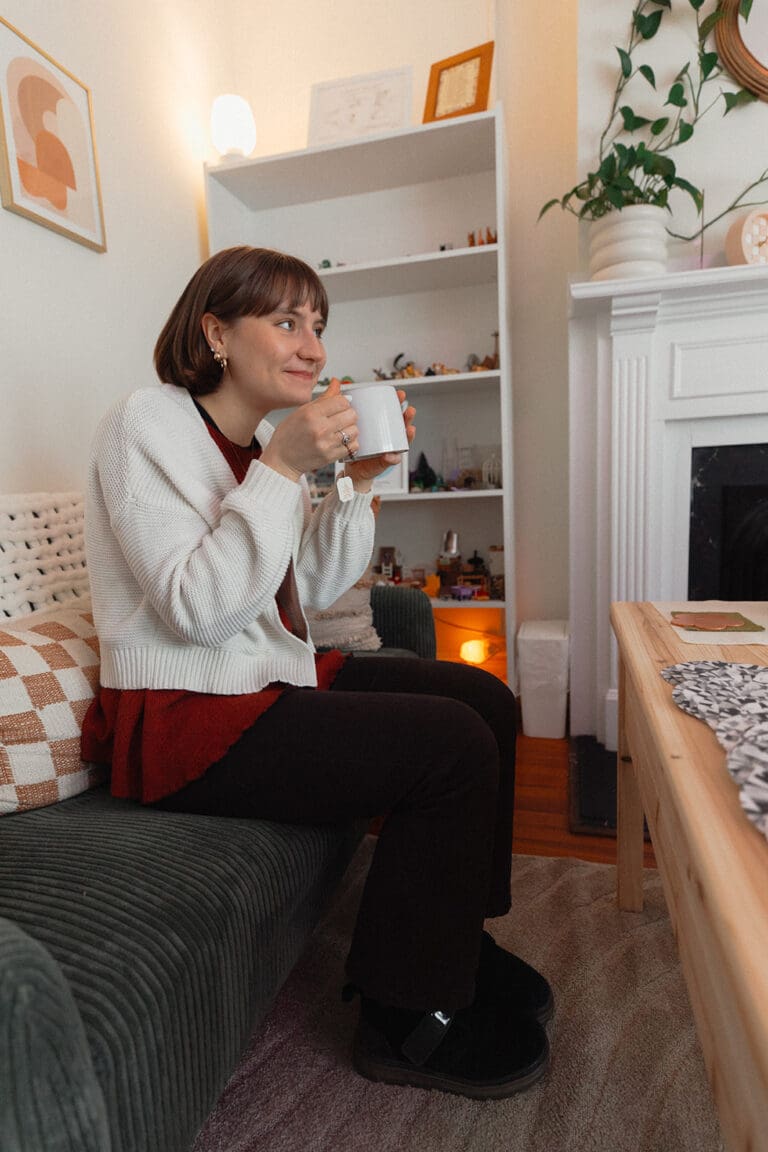 A client enjoying a cup of tea in their therapy appointment.