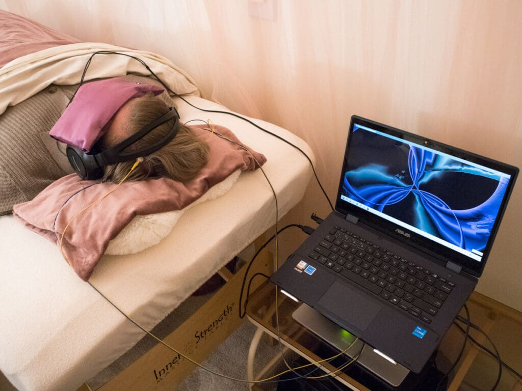 A client engaged in NeurOptimal® neurofeedback at PORTAL Therapy.